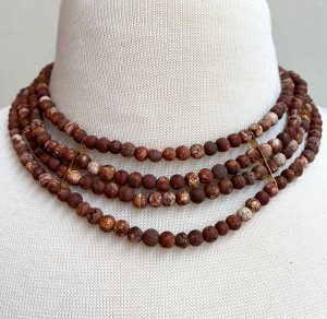 Red fire agate and brass necklace, part of the Gypsum Hills collection from Jennifer Woods Jewelry